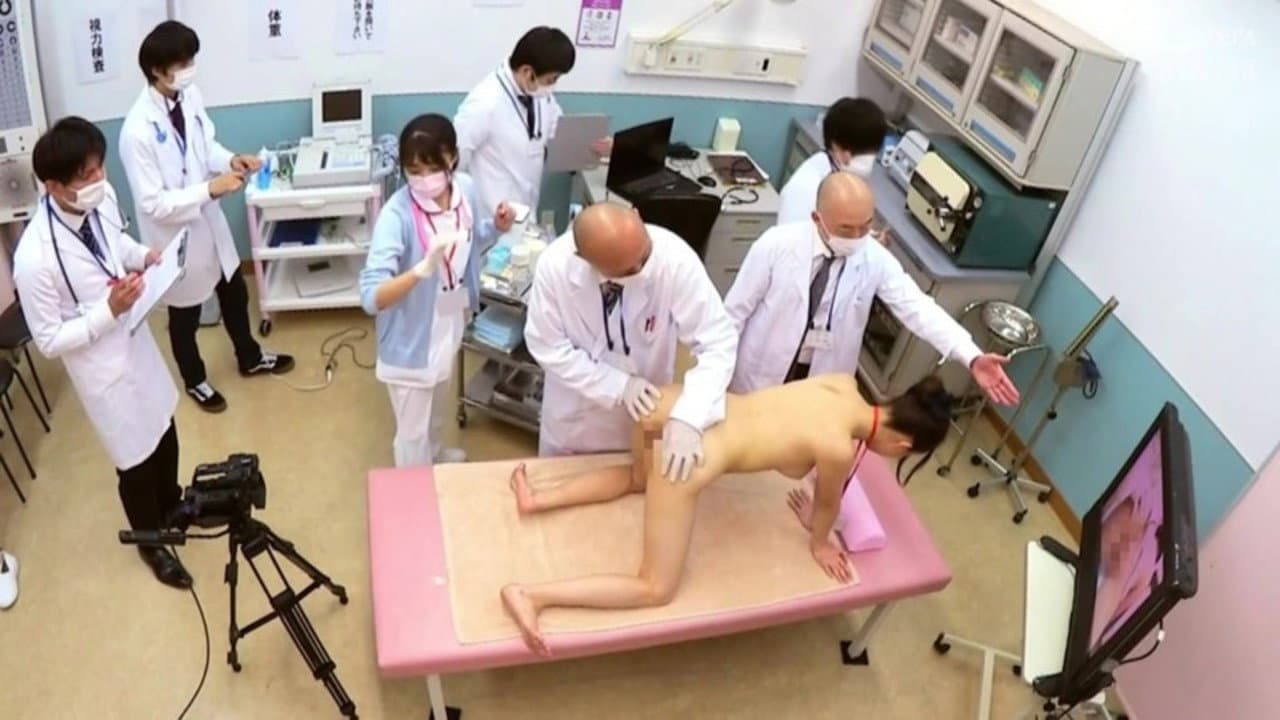 Shame! A Newly Appointed Nurse Takes A Medical Examination Before Being Assigned To Her New Post 2021 We Were Experimented On By The Resident Doctors backdrop